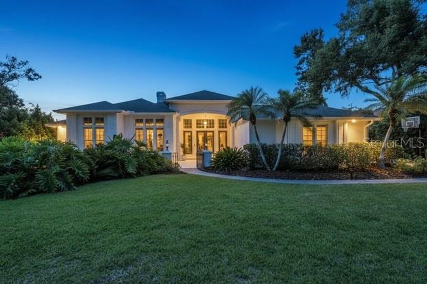 Set in the enchanting, tree-canopied gated community of Bent Tree – The Woodlands, find Modern Elegance in this 4-bed, 3.5-bath home sitting on a rare Estate size 0.70-acre pond-view lot. The mature trees and natural landscape create a peaceful, almost magical arrival.

Beautifully updated throughout, the home features large wood-look tile, Cambria quartz, a brand-new kitchen, Crown molding, plantation shutters, updated baths and major improvements including roof, AC, and hot water heater (approx. 6 years).

The outdoor living space is exceptional, offering a beautiful over-sized pool and spa framed by a picture-window cage overlooking the serene pond and lush greenery.

The location is outstanding — close to beaches, shopping, restaurants, and everyday conveniences — making this property a rare blend of privacy, elegance, and Sarasota lifestyle. The perfect home for someone who does not like cookie cutter homes and loves nature.  Come take a look.