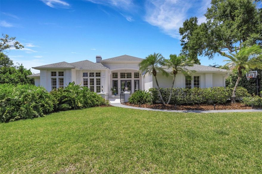 Set in the enchanting, tree-canopied gated community of Bent Tree – The Woodlands, find Modern Elegance in this 4-bed, 3.5-bath home sitting on a rare Estate size 0.70-acre pond-view lot. The mature trees and natural landscape create a peaceful, almost magical arrival.

Beautifully updated throughout, the home features large wood-look tile, Cambria quartz, a brand-new kitchen, Crown molding, plantation shutters, updated baths and major improvements including roof, AC, and hot water heater (approx. 6 years).

The outdoor living space is exceptional, offering a beautiful over-sized pool and spa framed by a picture-window cage overlooking the serene pond and lush greenery.

The location is outstanding — close to beaches, shopping, restaurants, and everyday conveniences — making this property a rare blend of privacy, elegance, and Sarasota lifestyle. The perfect home for someone who does not like cookie cutter homes and loves nature.  Come take a look.