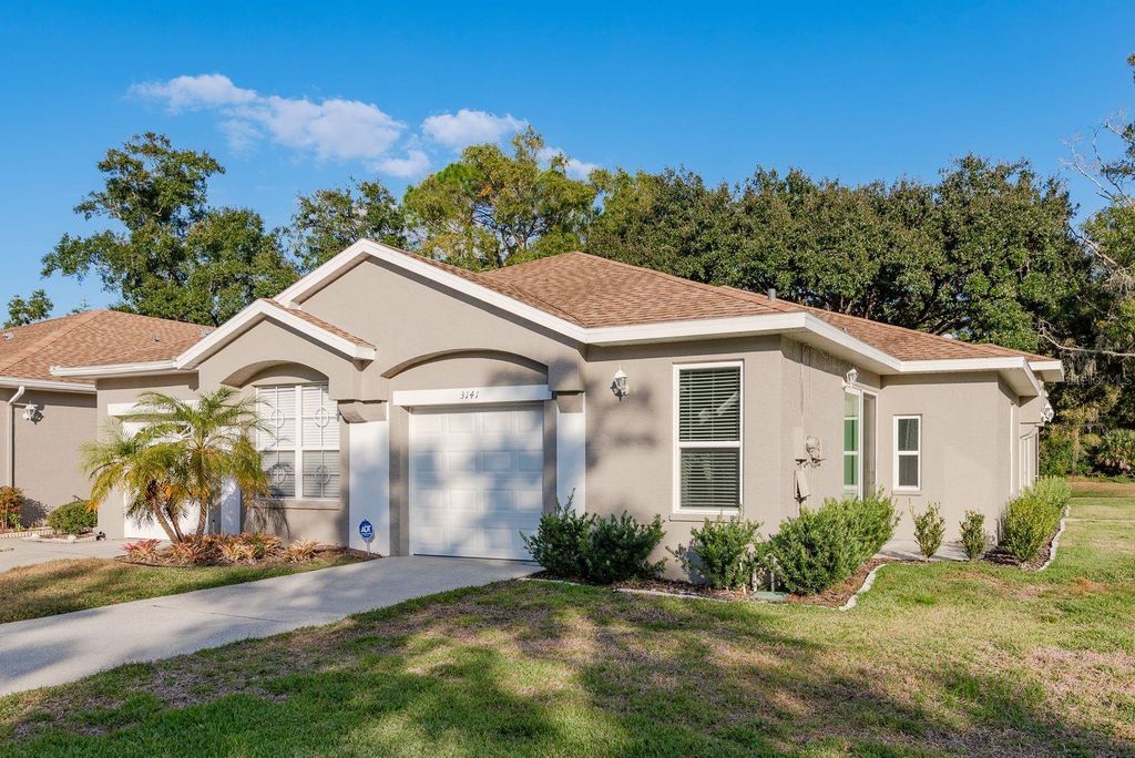 Photo of 3141 Brooker Creek Way, Palm Harbor, FL 34685 (MLS # TB8448877)