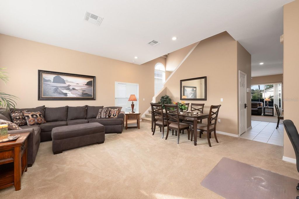 Photo of 549 Cadiz Loop, Davenport, FL 33837 (MLS # O6362540)