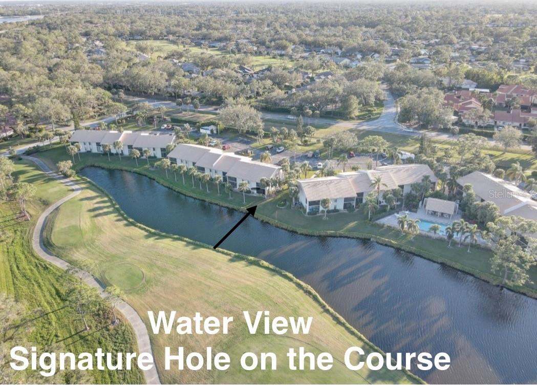 MOTIVATED SELLER! Bring Offers. FULLY FURNISHED END UNIT where PETS ARE WELCOME: Watch the sunrise over the water or enjoy the view of the Signature Hole on Meadows Country Club Golf Course. This END UNIT boasts lots of natural light with spacious HIGH CEILINGS, and WINDOWS ON THREE SIDES. GLASSED IN LANAI opens with surrounding glass sliders to feel the breeze. Pergo Laminate flooring with carpet in bedrooms and tile in bathrooms. WASHER/DRYER in unit. The kitchen exhibits lots of cabinet space and was recently updated with QUARTZ COUNTERTOPS, new stainless steel range and fridge. PRIMARY BEDROOM has walk-in closet and private bath with walk in shower. GUEST BATHROOM has a TUB/SHOWER COMBO. Catch the sunset through the kitchen, dinning and guest windows, nothing like the Florida Sunshine and just steps from the nearby pool.
NEW AC 2019, NEW TILE ROOF 2021, ENJOY LOW CONDO Fee of $317 monthly.
***Meadows Community Club is a central hub for social events, dinners and memories. Graced with 1,650 acres of open space and resort style living. Enjoy 14 miles of trails, fun activities, 1.7 mile fitness trail, 5,000 sq ft fitness and wellness center, Junior Olympic pool, 10 pickleball courts, dining venues plus pay-to-play three 18-hole golf courses (54 holes total) and a top-notch tennis complex with 17 Har-Tru courts, club house, outdoor dinning and tennis stadium. Only minutes from downtown Sarasota, AIRPORT and top rated beaches, arts and culture, Nathan Benderson Park, Mote SEA Aquarium, Whole Foods, Trader Joe’s and University Mall with entertainment and dining. MUST SEE!