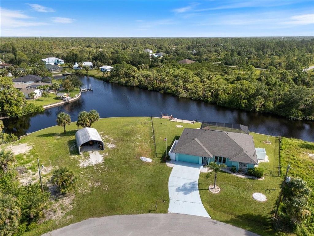 Photo of 12332 Corporal Circle, Port Charlotte, FL 33953 (MLS # C7512424)