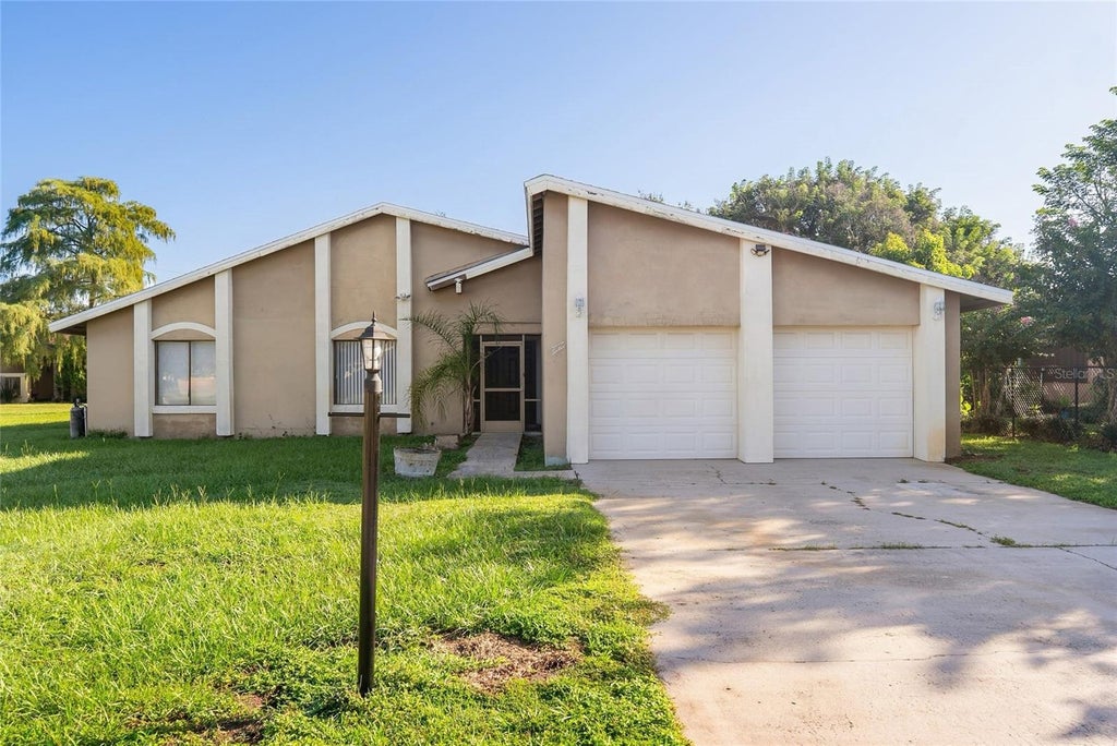 Photo of 712 E Flag Way, Kissimmee, FL 34759 (MLS # S5156438)