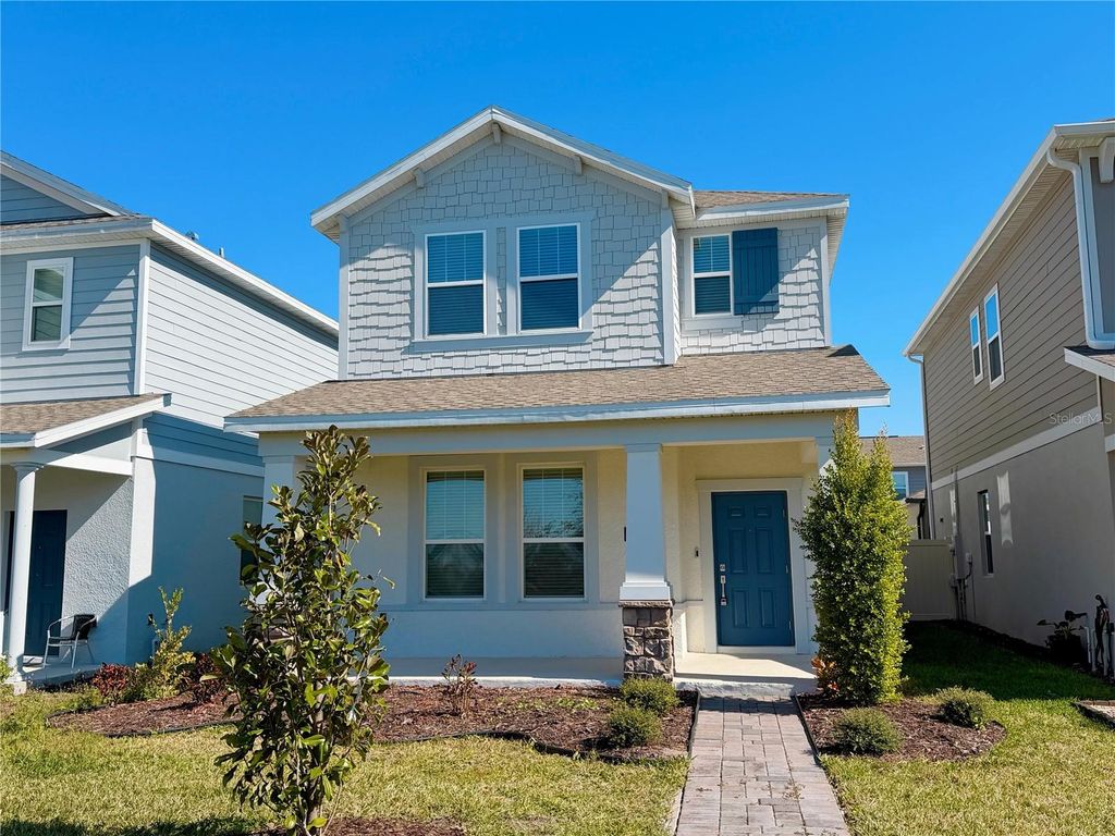 Photo of 1721 Good Neighbor Loop, Kissimmee, FL 34744 (MLS # O6371011)