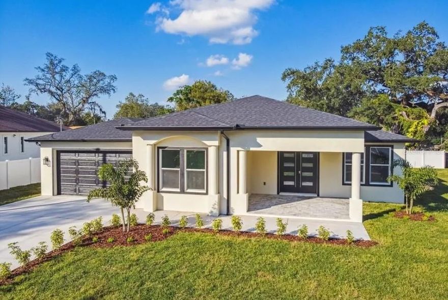 Welcome to this stunning newly built (2023) single-story luxury home located in one of Tampa’s most desirable and convenient areas — Citrus Park, near Carrollwood. This exceptional property offers the perfect combination of modern elegance, space, and freedom with NO HOA and NO CDD.

Situated just minutes from Citrus Park Town Center, top-rated restaurants, medical facilities, shopping plazas, churches, major highways, including Dale Mabry Highway and the Veterans Expressway, Raymond James Stadium, Tampa International Airport, and the world-famous Gulf Coast beaches, this location provides unmatched lifestyle convenience and accessibility. The home is also located near highly rated schools, making it an outstanding choice for families and investors alike.

This impressive residence features over 2,500 square feet of luxurious living space with 5 bedrooms and 3 full bathrooms. The home showcases high ceilings, exclusive luxury ceramic flooring, and a breathtaking open-concept layout designed for modern living and entertaining. The gourmet kitchen includes a large quartz island, luxury stainless steel appliances (range, refrigerator, and microwave), a designer range hood, and extended custom cabinetry throughout the kitchen and island.

The spacious living area is highlighted by a modern electric fireplace, creating a beautiful and inviting atmosphere. All three bathrooms feature luxury finishes, frameless glass shower enclosures, and smart mirrors.

Exterior features include a welcoming front balcony, a rear lanai perfect for relaxing or entertaining, and a nearly half-acre corner lot fully enclosed with premium vinyl fencing. The property includes an additional side gate allowing convenient access for RV parking or multiple vehicles.

With no rental restrictions, this property is ideal as a primary residence, vacation rental, Airbnb, or long-term investment opportunity.

Luxury, location, flexibility, and investment potential — this home truly offers it all.