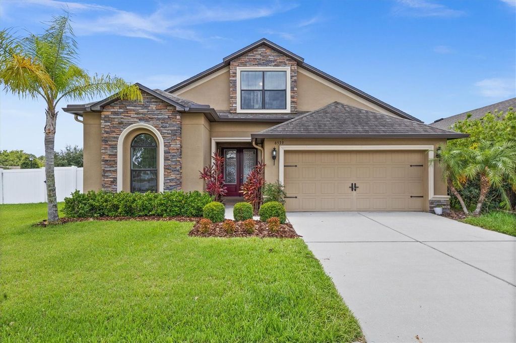 Photo of 6539 Boulder Run Loop, Wesley Chapel, FL 33545 (MLS # TB8488129)