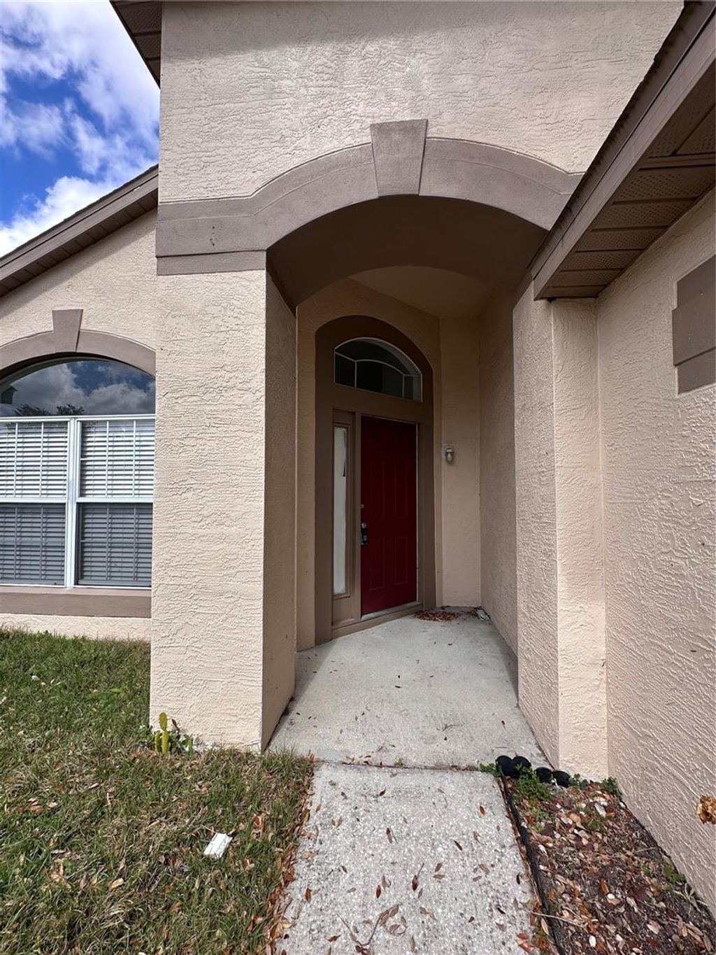 Photo of 8149 Woodsworth Drive, Orlando, FL 32817 (MLS # O6386894)
