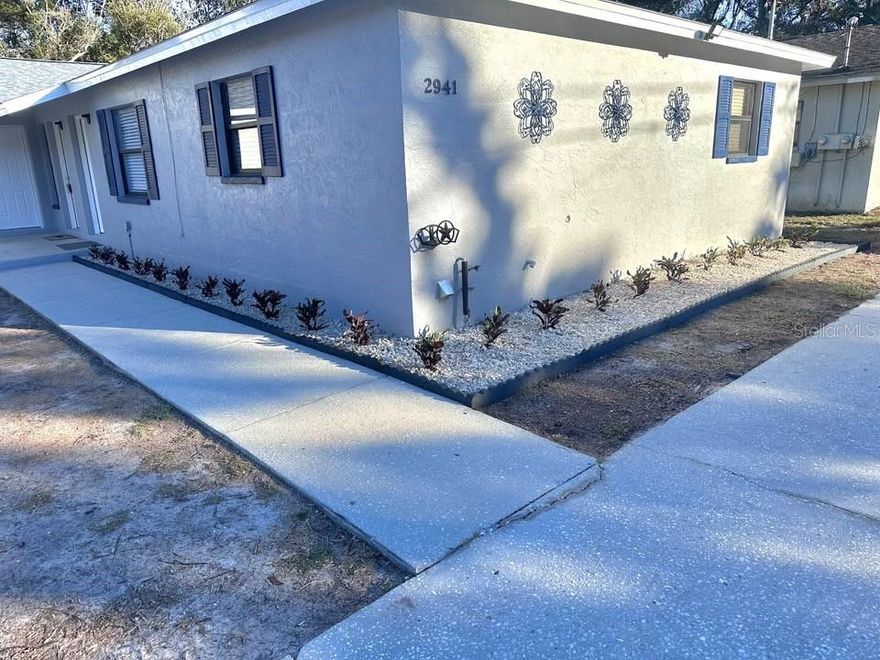 One or more photo(s) has been virtually staged. ***LOCATION ALERT***5 minutes from DOWNTOWN SAFETY HARBOR & PHILIPPE PARK! If you like to hear the word NEW, this home is for you. Be the first to live in this Spacious and completely remodeled 2-bedroom, 1-bath residence, just completed with no detail spared. This light and bright home features a modern open-concept floor plan with luxury vinyl flooring, recessed lighting, and ceiling fans throughout. The upscale kitchen offers granite countertops, dishwasher, garbage disposal, ice maker and all-new stainless-steel appliances. The spa-inspired bathroom has been fully updated with high-end finishes. Additional highlights include inside washer/dryer hookups, a large backyard (not fenced, but has plenty of room for doggie playpens), located at the end of a beautiful cul-du-sac street, and lawn care included. Zoned for Curlew Creek, Safety Harbor Middle, Countryside High School. Shed storage available for an additional monthly fee. Conveniently located near downtown Safety Harbor shops, dining, marina, and Safety Harbor Resort & Spa. Move-in ready and available for immediate occupancy.