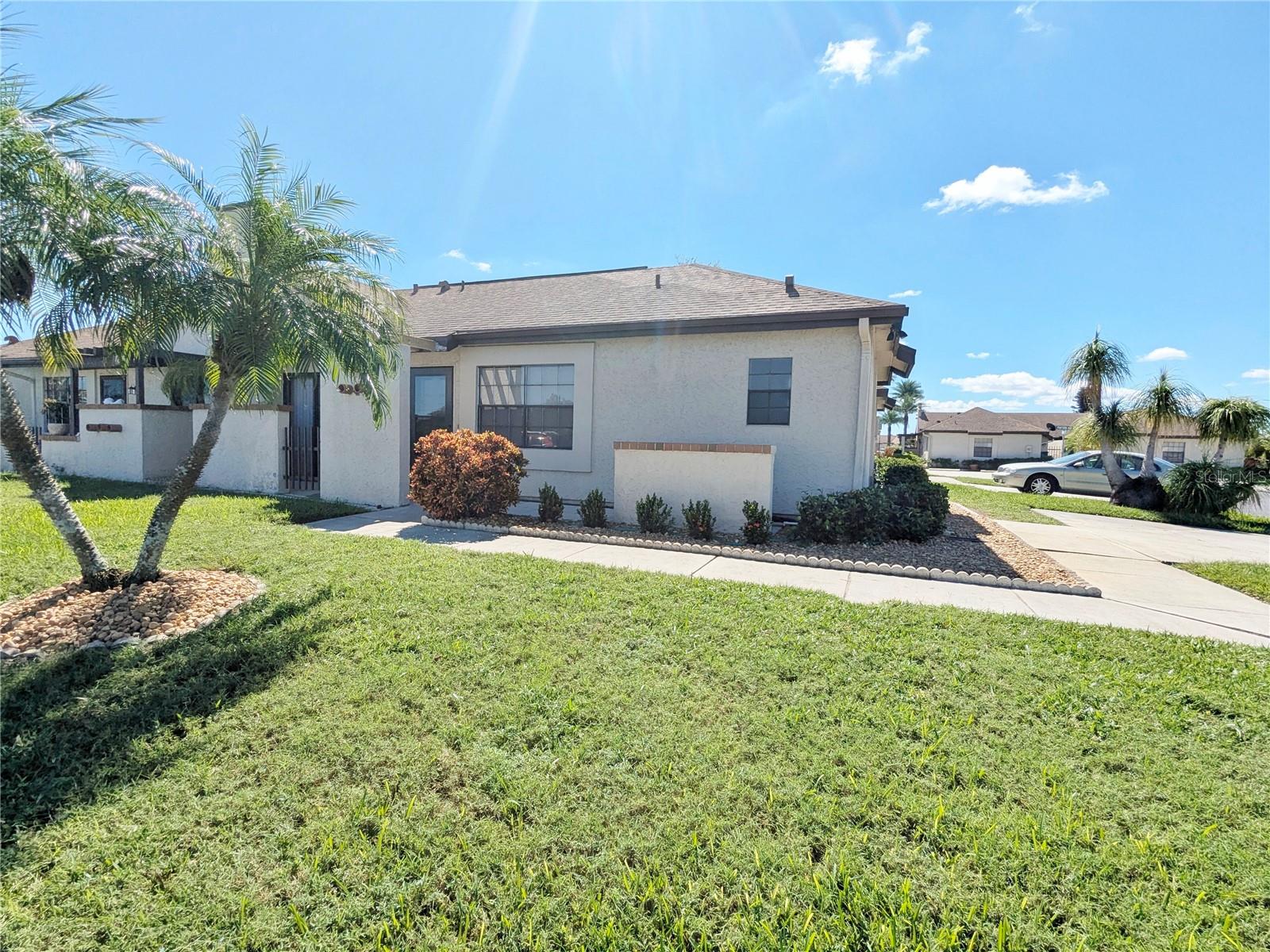 **ANNUAL** BEAUTIFUL 2/2 VILLA END UNIT AVAILABLE NOW** Ceramic tile in living areas with carpet in both bedrooms. NEW APPLIANCES in kitchen! Master bath has walk in shower.  Enjoy living in a small community with private parking for two vehicles. Washer and dryer are included along with a private lanai! Perfect to entertain and enjoy the beautiful weather! There is also an outdoor storage unit close to lanai. Located close to beaches, shopping, and restaurants. Call for showing appointment today!! 
(Association requires a $150 application fee. No pets per Association. No commercial trucks, motorcycles, or recreational vehicles per Association)