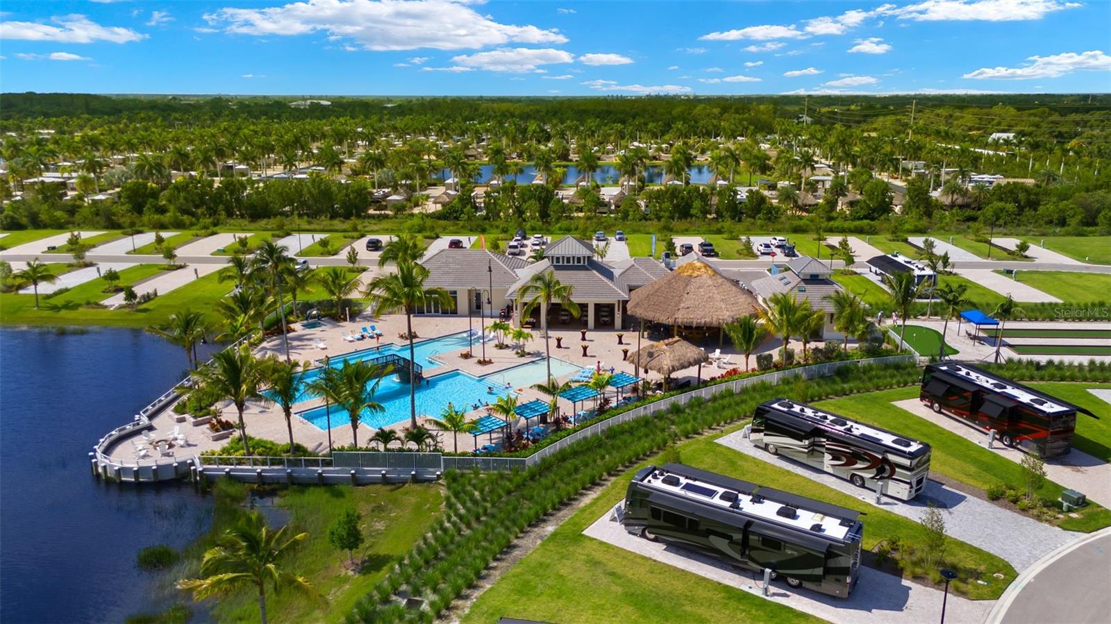 Escape to your private tiki hut paradise at Laguna Caribe—where tropical charm meets Motorcoach luxury in Southwest Florida. This state-of-the-art Class A RV Resort boasts 137 meticulously finished lots, each featuring elegant landscaping, brick pavers, and comprehensive utilities including 200 Amp hookups, water, sewer, cable, and more. Opt for one of the many exquisite casita designs or build your own tiki retreat right on your lot. Indulge in a lifestyle of leisure with stunning, resort-style amenities. Lounge by the breathtaking pool, enjoy drinks at the Tiki bar, or challenge friends at our lighted pickleball and bocce courts. Furry friends can roam free in our expansive dog park. For golf lovers, a putting green is ready to sharpen your short game. Perfectly located off I-75, Laguna Caribe grants access to the area’s best fishing, boating, golfing, dining, and shopping. Nearby sandy beaches just minutes away. At the Coral Club, coastal living blends seamlessly with island luxury, delivering the premier RV resort experience in Southwest Florida. With professional rental management on site, this is more than a vacation destination—it’s a smart investment. Updated pictures coming soon. Lots range from 4,140 to 8,361 Sq. Ft. Priced $170,000 to $305,000. Schedule your tour at Laguna Caribe today!