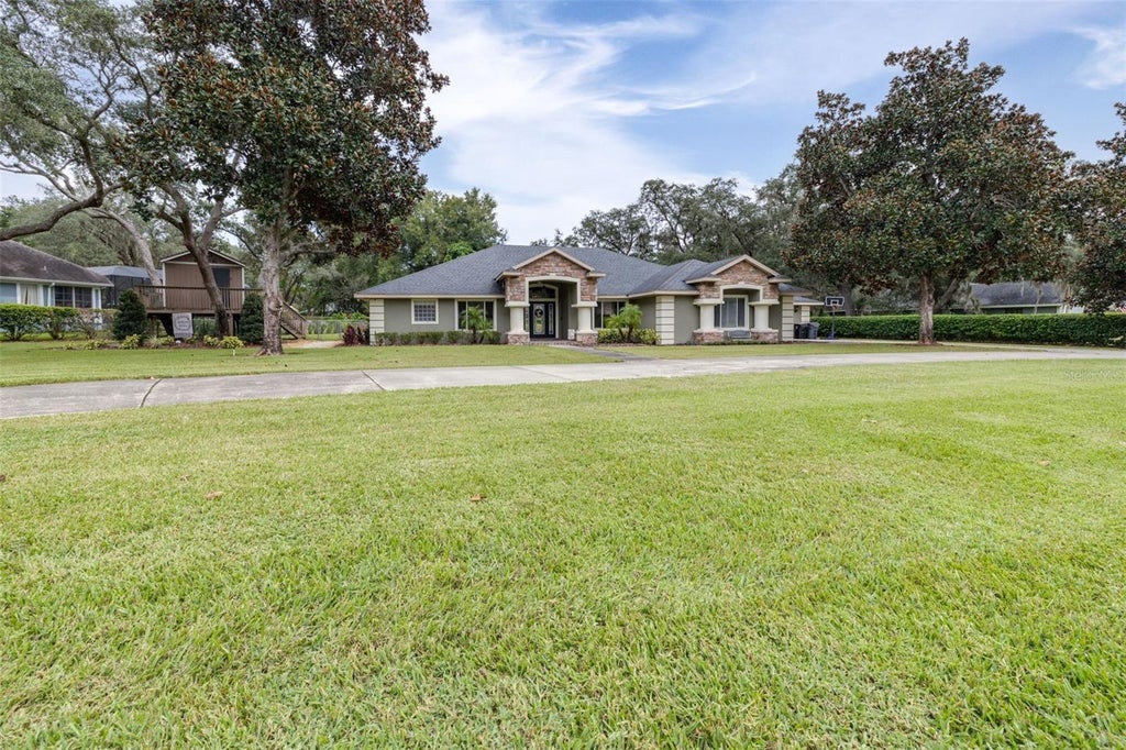 Photo of 86 Pine Forest Lane, Haines City, FL 33844 (MLS # L4965510)