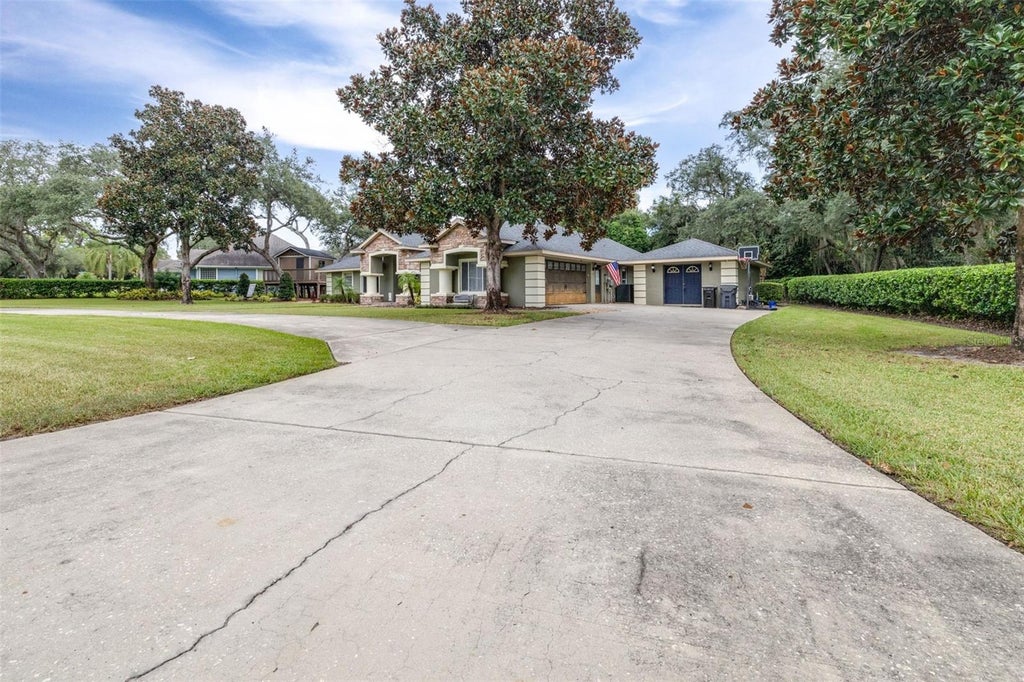 Photo of 86 Pine Forest Lane, Haines City, FL 33844 (MLS # L4965510)