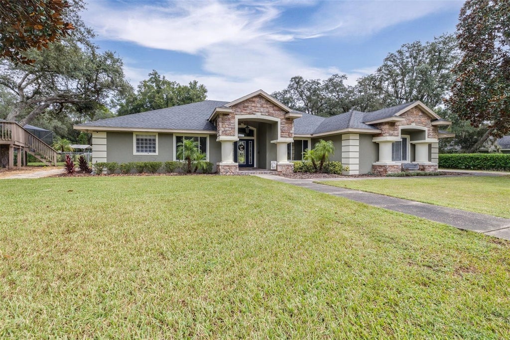 Photo of 86 Pine Forest Lane, Haines City, FL 33844 (MLS # L4965510)