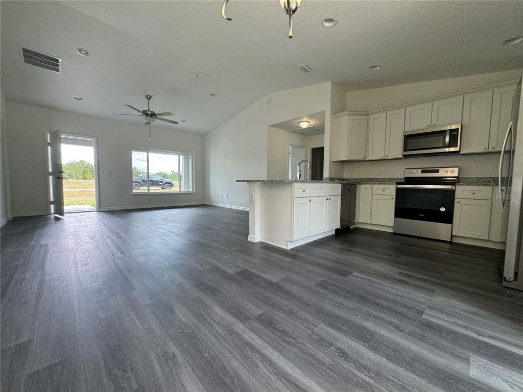 Photo of 91 Maple Drive, Ocklawaha, FL 32179 (MLS # O6330892)