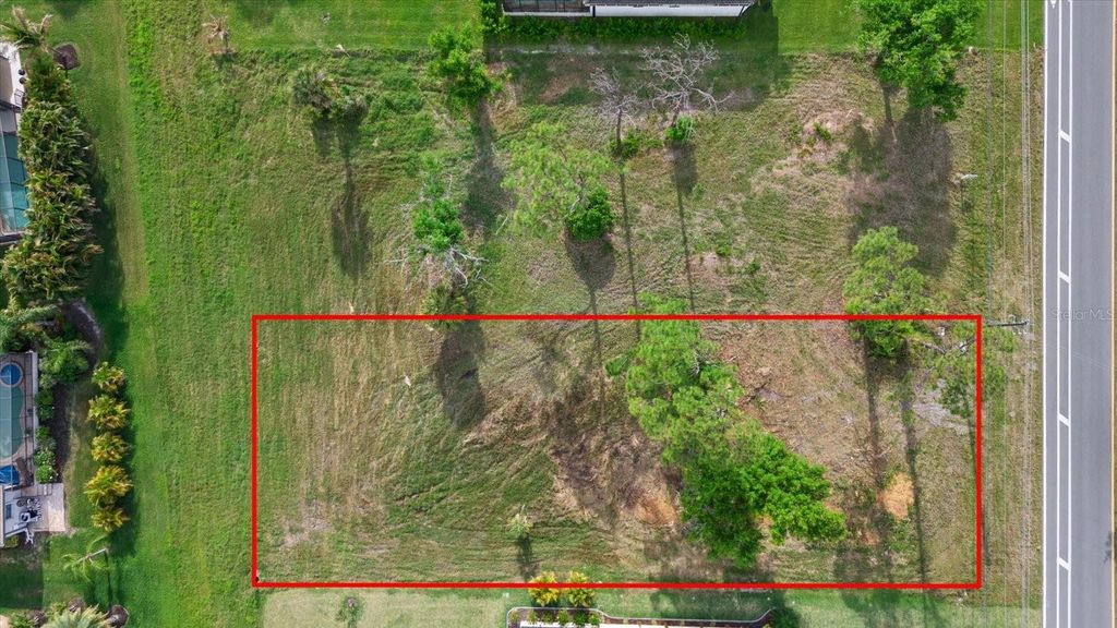 Photo of 170 Rotonda Boulevard E, Rotonda West, FL 33947 (MLS # A4687939)