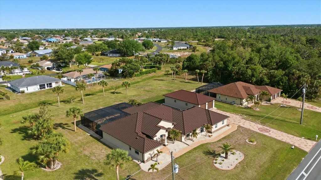 Photo of 170 Rotonda Boulevard E, Rotonda West, FL 33947 (MLS # A4687939)