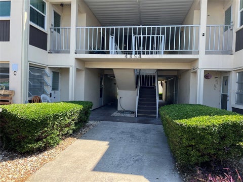 Photo of 4854 Marine Parkway #103, New Port Richey, FL 34652 (MLS # TB8547468)