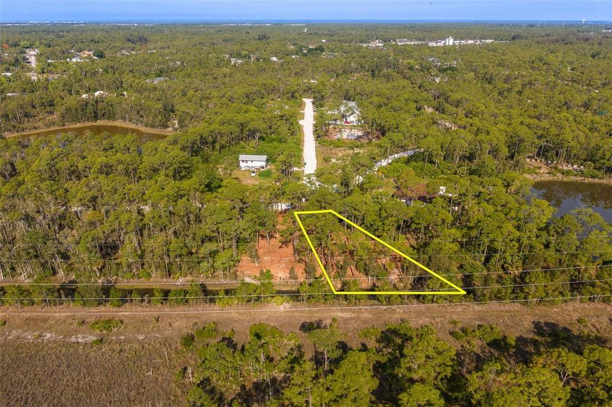 This cleared lot is in your own little wooded quiet region of Punta Gorda. The parcel has been recently cleared, making it easy to brainstorm your new building plans as the property wasn't accessible beforehand. Head to the back of the property and see the water views of the canal that is connected to multiple pond/lakes nearby. You have no neighbors behind you and wooded areas to each side of you creating a nice private space. There is wildlife nearby, yet you're also not far from the highway, interstate or local shopping. The seller also owns the second cleared adjacent lot that is also being listed together if you want a larger lot. The recently done survey is also included. It is a rare find to get a cleared lot that can still provide privacy. Bring your ideas or building plans.