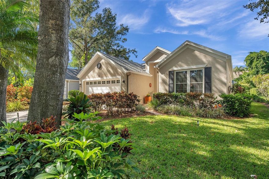 If you've been waiting for just the right house in just the right community, then your patience has paid off! Oak Court is unique hidden enclave of just 64 homes located in a gated community with a park like setting. Its Central Location ensures quick access to Sarasota's Downtown District, Our world-famous beaches, Shopping and Dining at University Town Center, Local Parks, Golf Courses, Great Schools & much more! Upon entering Oak Court, you'll immediately notice the serene ambiance created by the quiet streets and the beauty of the Majestic, Mature Canopy Trees that line the neighborhood. This updated, move in ready home is a 3-bedroom, 2-bathroom, 2 car-garage home and has been well cared for over time. Boasting a bright and airy floor plan that welcomes you upon entry with an open living and designated dining where you will find impressive 12-foot ceilings, sliding glass impact doors, and windows, allowing for ample natural light. The spacious kitchen has dual pantries, quartz countertops, newer cabinets and an eat in area that has triple windows looking out at the tranquil landscaping in the backyard. The laundry room is conveniently located off of the kitchen. The primary bedroom is a relaxing retreat within the home, featuring an en-suite bathroom with a newly renovated shower & unique dual sink, as well as a generous custom walk-in closet. The two private guest rooms are conveniently located on either side of a shared bathroom. One is currently set up as an den/office with french doors. For relaxation, entertainment and enjoyment of the outdoors, a large screened-in lanai extends from the family room overlooking the lush Landscaping & Butterfly Garden. The community offers a welcoming and friendly environment, with amenities such as a heated community pool, walking paths, sidewalks, and two tranquil ponds that attract abundant bird life. Garage has an ELECTRIC CHARGING STATION for your electric car! Recent updates include NEW ROOF 2022. NEW IMPACT WINDOWS 2021. WATER HEATER 2021, A/C 2014. LOW HOA fees of $183/month and NO CDD fee. Some photos have been virtually staged. This is a MUST SEE HOME! Call today to schedule your showing before it's gone!