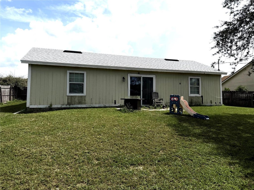 Photo of 2861 Fifer Drive, Deltona, FL 32738 (MLS # R4911998)