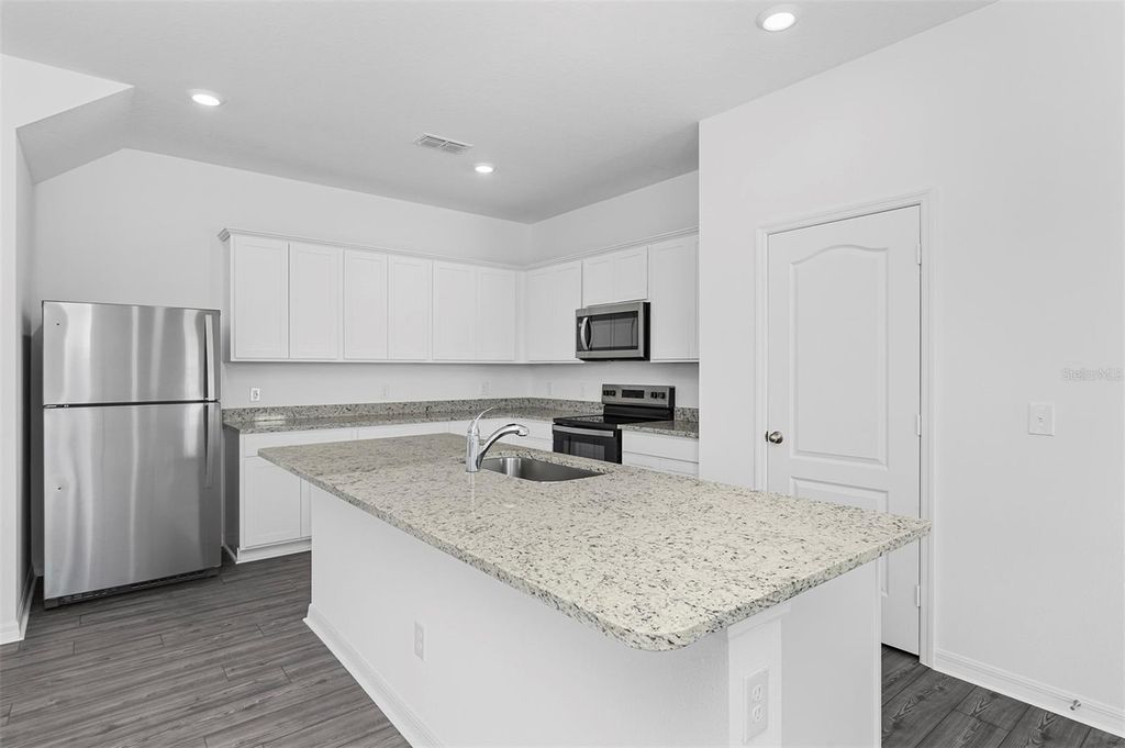 Photo of 612 Bay Leaf Drive, Poinciana, FL 34759 (MLS # TB8441118)