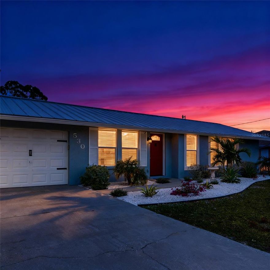 FANTASTIC LOCATION in the heart of Englewood! This immaculate 3-bedroom, 2-bath home is light and bright with a fresh coastal color palette throughout. Situated on an oversized, partially fenced .30-acre lot, the property offers a 1-car garage and an expansive backyard with plenty of room to add a pool. Enjoy outdoor living in the new enclosed 3-season lanai surrounded by large, screened windows, plus an additional open patio with a new sail shade pergola complete with roller shades—perfect for relaxing or entertaining. The primary suite features a walk-in closet and a full en-suite bath.
Recent upgrades include a new metal roof, updated electrical panel, updated windows, luxury vinyl flooring, A/C system (August 2019 & recently serviced), complete remodel of primary bathroom and newer water heater. An additional concrete pad provides convenient parking for a boat, jet skis or RV, with a 30-amp electrical outlet. The county public boat ramp is at the end of the street!  Professional landscaping recently complete to give the home a coastal feel.
In the highly sought after X FLOOD ZONE, No HOA, No Fees, No Deed Restrictions.  Located within 3 miles of Englewood Beach and just a 3-minute drive to Historic Downtown Englewood, where you’ll find excellent dining, shopping, festivals, and entertainment. In fact, all this is easily accessible by bike, golf cart or a nice walk.  Englewood is also home to multiple golf courses and world-class fishing. This home truly offers the best of Florida living!
