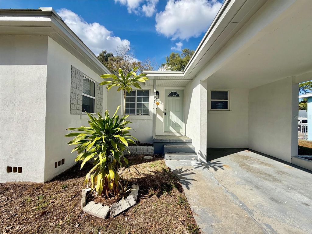 Photo of 8023 Country Club Road N, St Petersburg, FL 33710 (MLS # TB8484001)