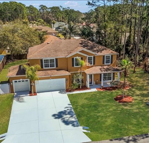 Photo of 4 Lake Charles Place, Palm Coast, FL 32137 (MLS # FC316619)