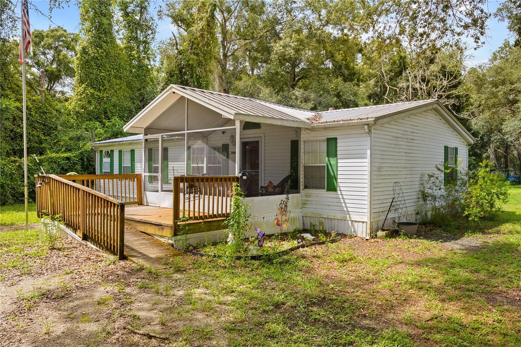 Photo of 7531 NW 165th Street, Trenton, FL 32693 (MLS # O6438069)