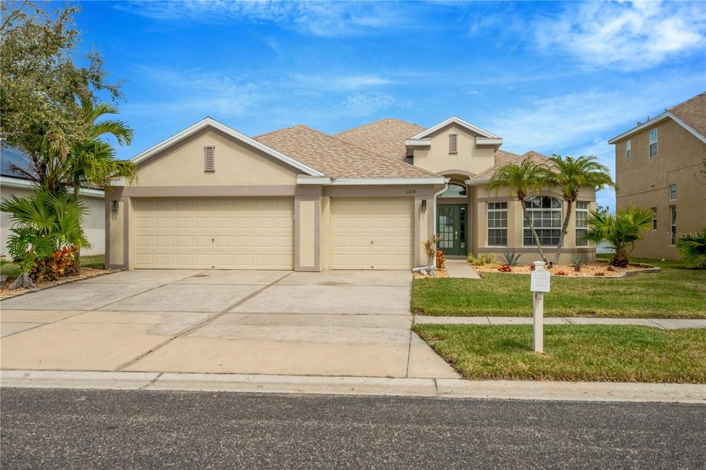 Photo of 1834 Mira Lago Circle, Ruskin, FL 33570 (MLS # TB8484437)