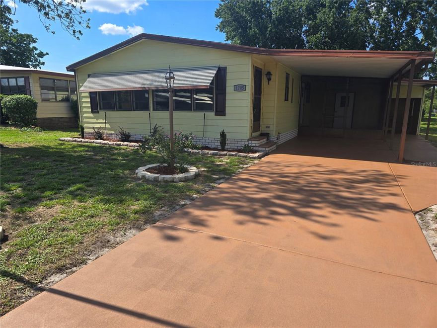 NEW ROOF, NEW AC, NEW FLOORING, NEW PAINT, NEW QUARTZ COUNTERTOPS AND NEW STAINLESS STEEL APPLIANCES. THREE BEDROOM COMPLETELY UPDATED home in Orange Blossom, IN The Villages. There is no bond, no CDD. It is conveniently located minutes from Spanish Springs Town Square, which is close to your shopping needs, plenty of restaurants, and entertainment. The luxury vinyl flooring was installed in 2025. The kitchen has been fully updated. Primary bedroom is spacious, as well as the 2, YES TWO, guest bedroom which could double as an office or two if needed. Step outside into a screened lanai, enclosed laundry. Also has golf cart garage and a carport. New AC in 2025. COMES WITH A GOLF CART. SELLER MOTIVATED!....MAY ALSO TRADE