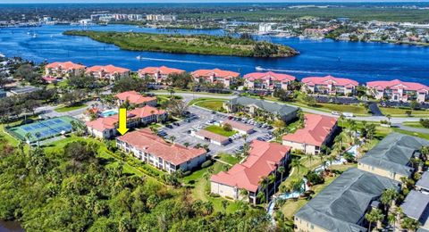 Photo of 402 Bouchelle Drive #206, New Smyrna Beach, FL 32169 (MLS # O6397802)