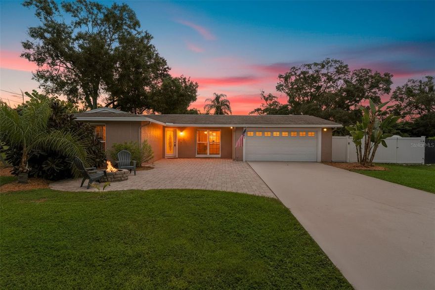 Welcome to this CHARMING HOME tucked away on a quiet, divided street in BEAUTIFUL DOWNTOWN OLDSMAR—just steps from the waterfront parks, walking and biking trails, and peaceful picnic areas that make this neighborhood so special. Situated on an EXTRA-LARGE 100x150 LOT, this nearly 2,000 SQ FT home offers both space and character, with a long list of MAJOR UPDATES: a NEWER ROOF (2017), TWO BRAND NEW A/C UNITS (OCT 2022), COMPLETE RE-PLUMB (OCT 2022), and UPDATED ELECTRICAL AND LIGHTING IN THE WORKSHOP (OCT 2022). Inside, you’ll find fresh interior paint (2022) and a thoughtfully designed layout that blends classic style with modern comfort. The kitchen is a cook’s dream—featuring SOLID MAPLE CABINETS, GRANITE COUNTERS, UNDER-CABINET LIGHTING, a prep sink, and STAINLESS STEEL APPLIANCES including a range with microwave/convection oven and warming drawer. Enjoy elegant details like PLANTATION SHUTTERS, CROWN MOLDING, and a welcoming formal living space. A massive BONUS ROOM with VAULTED CEILINGS, FRENCH DOORS, and a 12” STEEL-REINFORCED FOUNDATION provides endless possibilities for entertaining, a home office, or even a future primary suite. Out back, the FULLY FENCED YARD offers plenty of room to roam plus a WORKSHOP/STORAGE SHED, 50 AMP RV/BOAT HOOKUP, and even a FRONT YARD DUMP STATION FOR RV WASTE WATER—a rare find! Homes with this combination of space, updates, and location rarely come available in Oldsmar. Don’t miss your chance to own a piece of this vibrant, walkable community!
