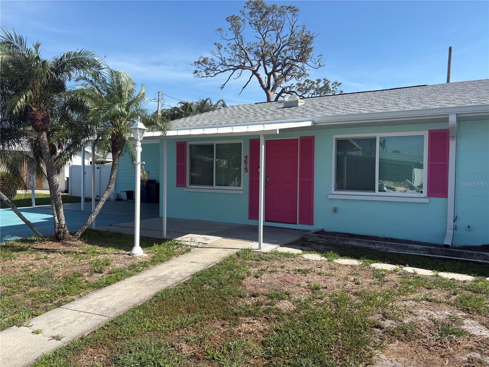 For Rent! Pet friendly up to 2 dogs under 35lbs! Unfurnished Annual Rental! This 2 bed 1 bath 1/2 duplex is the definition of location, location, location! This unit is just 5 minutes away from the Shoppes of Paradise Bay in one direction and 5 minutes away from Anna Maria Island and Cortez Beach in the opposite direction. It also sits a short walk around the corner from the Sarasota Bay where dolphins and manatees like to hangout during the summer months. The kitchen and living room flow together to make one great space and the kitchen comes equipped with all the necessary appliances including; fridge, microwave, stove, oven, microwave, and dishwasher. One bedroom sits just off the kitchen while the other can be found in the back of the home next to the bathroom with a huge walk in closet. Outside the back yard is completely fenced in for ultimate privacy. This unit also boasts a large driveway with covered parking space that sits in front of an enclosed storage area available for tenant use. There is space in the laundry room for storage, washer and dryer included with unit. Dog subject to approval with non-refundable one-time fee of $150.00.
