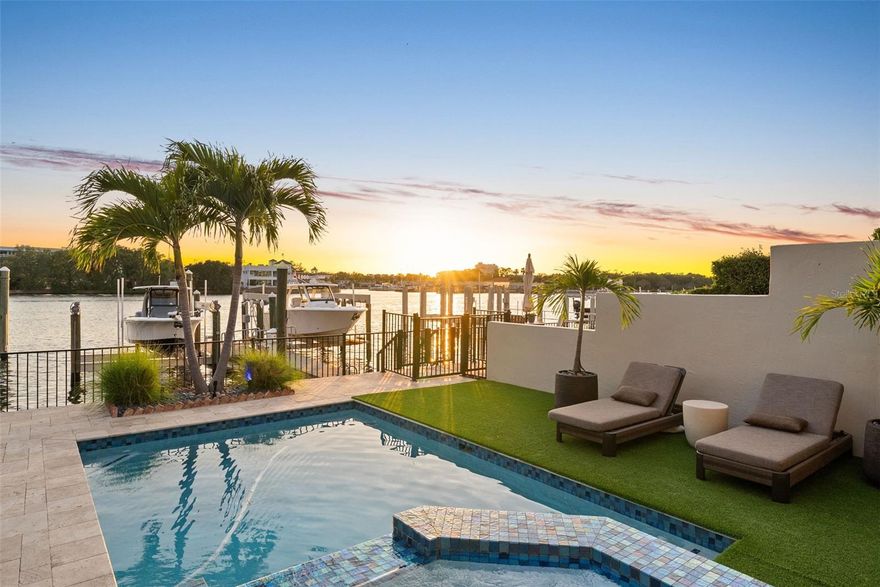 Completely redesigned luxury waterfront residence on prestigious Harbour Island offering the pinnacle of casual sophistication and resort-style living in the heart of Tampa. Deep-water access
to Tampa Bay and the Gulf with private boat slip, new 20,000-lb boat lift, and spectacular daily sunset views. Expansive indoor/outdoor living with over 4,000 SF designed for entertaining,
featuring a private pool, spa, covered lanai with sunshade, second-floor balcony, and exceptional privacy within a 24-hour guarded gated community. Thoughtfully reimagined interior
showcases open-concept living spaces, stylish work-from-home nooks, and seamless flow from elegant entry to the stunning chef’s kitchen and great room. Gourmet kitchen features Wolf
and Sub-Zero appliances, oversized drawer storage, walk-in pantry, coffee bar, and spacious dining area. Step outside to a waterfront paradise complete with built-in Wolf outdoor kitchen,
poolside lounging, and direct boating access. First floor includes a private guest suite or fitness room with adjacent full bath. Upstairs offers three additional bedrooms, three full baths, laundry
room, and a luxurious primary retreat with private covered balcony and captivating water views. Spa-inspired primary bath features split vanities, abundant storage, and an Asian-inspired
soaking tub/shower room. Secondary bedrooms are thoughtfully separated for maximum privacy. Recent upgrades include pool, outdoor kitchen, windows, doors, and boat lift. Oversized
air-conditioned garage accommodates two large vehicles with abundant storage. Harbour Island residents enjoy unmatched convenience just moments from Water Street, Sparkman Wharf,
Tampa Riverwalk, Bayshore Boulevard, Amalie Arena, premier dining, entertainment, I-275, Selmon Expressway, and only 15–20 minutes to Tampa International Airport. Move right in and enjoy
the waterfront lifestyle you’ve always imagined.