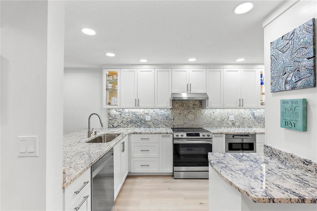 Photo of 9433 Harbor Greens Way #306, Seminole, FL 33776 (MLS # TB8467648)