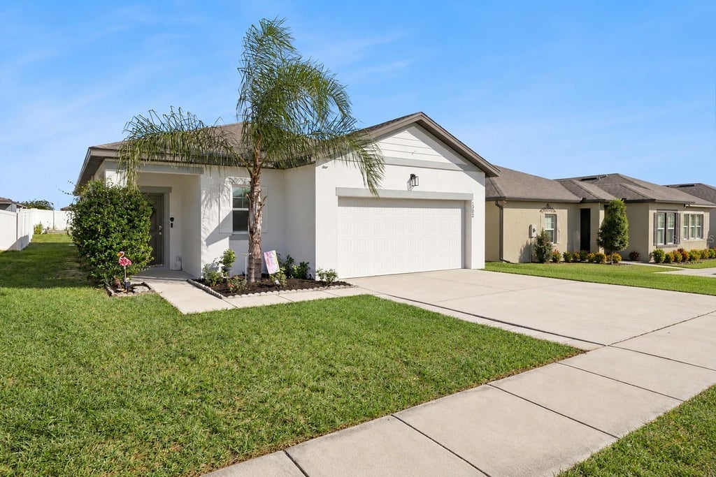 Photo of 1202 Lycaste Drive, Davenport, FL 33837 (MLS # S5159956)