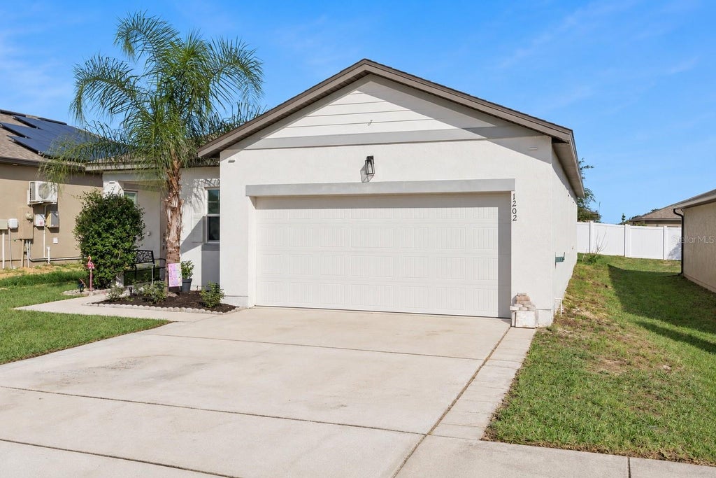Photo of 1202 Lycaste Drive, Davenport, FL 33837 (MLS # S5159956)