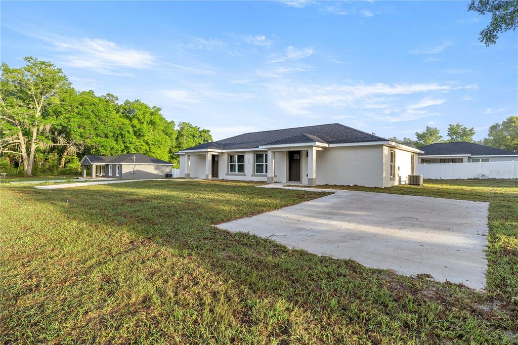 Photo of 5393 NW 7th Place, Ocala, FL 34482 (MLS # OM722336)