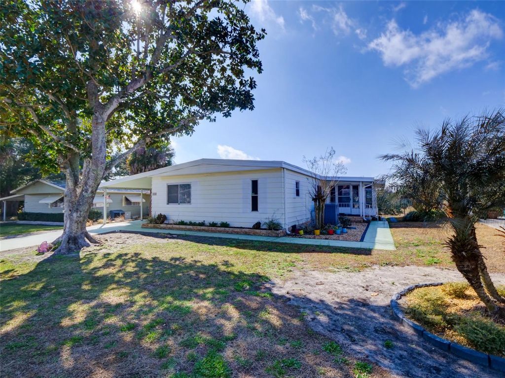 Photo of 2218 Orangewood Circle #1540, Zellwood, FL 32798 (MLS # O6377366)