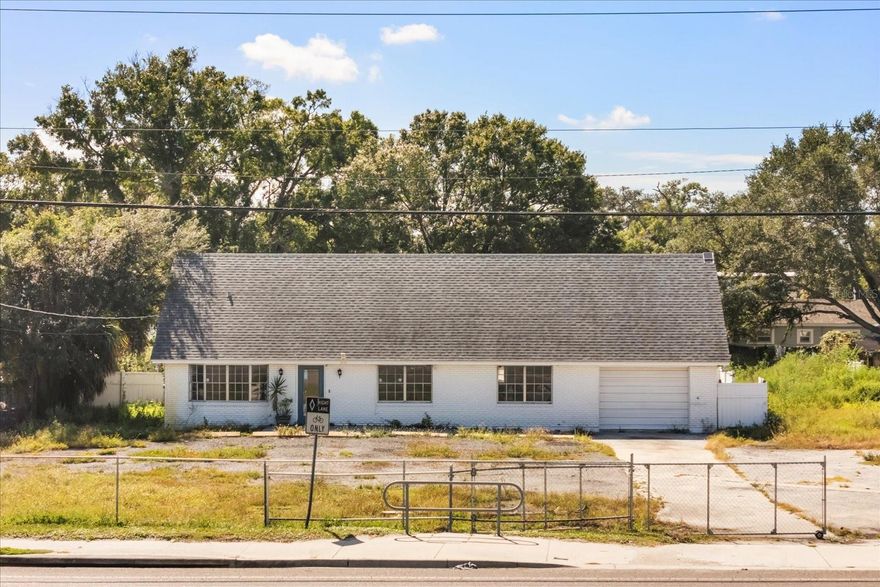 Mixed-Use Gem! This rare property, formerly operating as a body shop, or visualize it as a native boutique farm, park café and restaurant concept, small food-court destination. Sits on over 1.12 acres with high visibility just minutes from downtown Tampa. The two-story building features a first-floor offices with full bathroom, garage, and a full 2bdr upstairs apartment, perfect for live/work flexibility, rental income, or incorporated into the business space.
Now available for lease at $6,900 NNN, this versatile property provides a rare opportunity to combine business, lifestyle, and investment potential in one prime Tampa location.
The expansive grounds provide ample space for vehicle storage, perfect for car dealership, equipment staging, or business expansion, making it an exceptionally versatile commercial asset. Located on a prime city street near major intersections, this property combines functionality, location, and value, with the land alone making it an incredible investment.