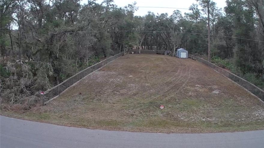 Residential vacant lot in Webster, FL that is fully prepared and ready for a dream home. The property has been professionally cleared and leveled, providing a build-ready site. A well has been drilled and includes a new pump and tank. Two new storage buildings are on site and included with the sale.

The property is fenced on three sides, with fencing materials included to complete the front. All improvements have been completed with required permits. Ideal opportunity for a custom-built home in a quiet setting. Buyer to verify zoning, building requirements, and intended use with the county.