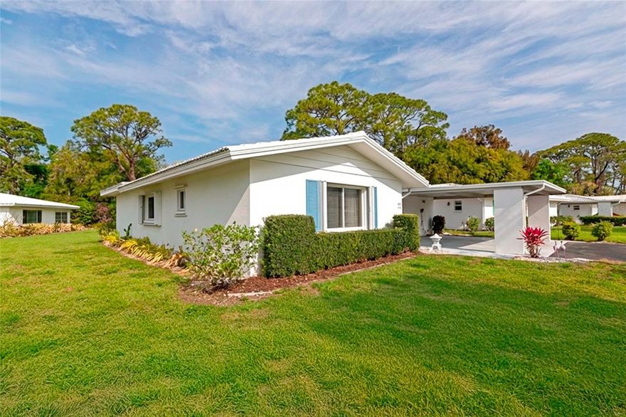 Welcome to maintenance-free Florida living in the highly desirable 55+ community of Strathmore Villas! This rare beauty offers the privacy of a single-family home with only the carport and storage area attached, perfect for buyers seeking low-maintenance, and easy living in a convenient location. This 2 bedroom, 2 bathroom home features a spacious airy layout with a large living room, a separate dining area, and abundant natural light throughout, ideal for both relaxing and entertaining. The fully equipped kitchen is designed to impress with ample cabinetry, matching appliances, a butcher block center island, and unique backsplash and countertops that create a charming coastal, beach-inspired feel. The primary suite is a true retreat, complete with a private en-suite bathroom featuring a relaxing walk-in shower. The second bedroom and full guest bathroom offers flexible space, perfect for overnight guests, a home office, or hobby room.
Enjoy your own tropical backyard oasis with lush landscaping, making it the prime spot for morning coffee, gardening, or soaking up the Florida sunshine in peace. Residents of Strathmore Villas enjoy resort-style, maintenance-free amenities, with HOA fees covering roof, exterior maintenance, grounds care, pest control, water, sewer, trash, basic cable, escrow reserves, plus access to a community pool and clubhouse, making this an excellent option for snowbirds or full-time residents. Location is everything, and this home delivers! You’re just minutes from UTC Mall, downtown Sarasota, St. Armands Circle, championship golf courses, top-rated restaurants, shopping, and world-famous Gulf beaches. If you’re searching for a move-in ready villa, this is the one. Don’t miss your chance to own a piece of paradise, call today to learn more!