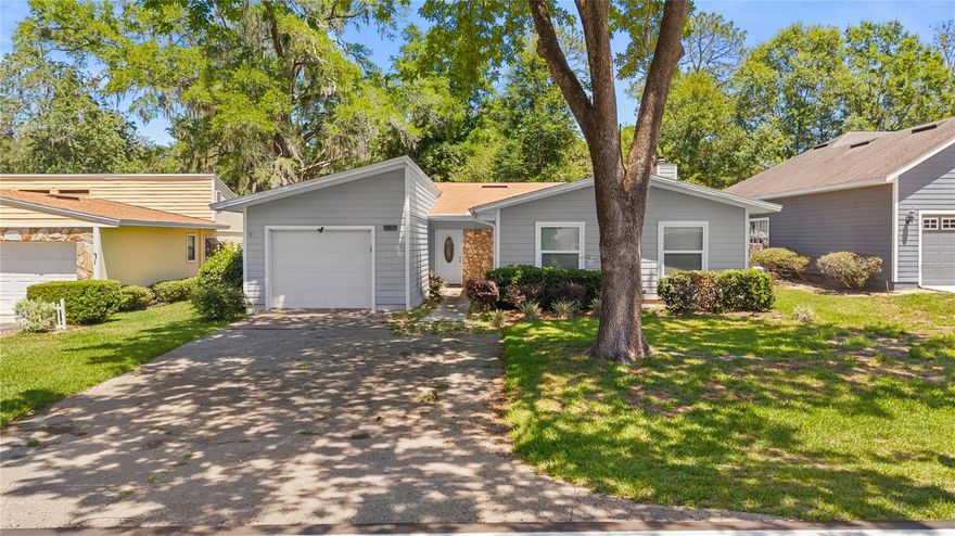 This beautiful home is located in one of the most beautiful golf courses in the Gainesville area. Gated community placed conveniently off SR441 between Gainesville and Alachua! Home sits on the 16th fairway. Spacious living room and large enclosed/screened patio that is great for entertaining or just relaxing. 2020 Roof. 2017 HVAC. Clubhouse and Restaurant open providing live entertainment and convenient dining in your own neighborhood. Large community pool. Best of both worlds, quiet/ safe neighborhood with infinite recreational opportunities.