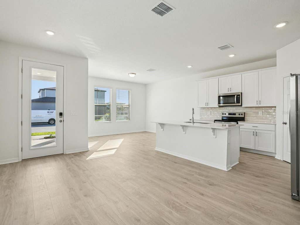 Photo of 4689 Cross Prairie Parkway, Saint Cloud, FL 34772 (MLS # TB8534174)