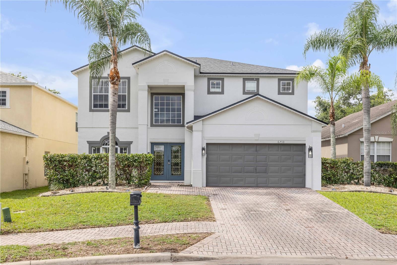 You don't want to miss this 4 bedroom, 2.5 bath pool home, nestled on a cul de sac with a view of the pond.
This gated community is located with easy access to I/4, area attractions, restaurants, shopping, and medical
facilities and is only 5 minutes from Bill Frederick Park. It is also zoned for top rated schools. Upon entry you
are greeted with a large foyer with a staircase to upstairs with beautiful vaulted ceilings throughout the home.
Kitchen is fully equipped with range, refrigerator, dishwasher and microwave. It also includes a walk-in pantry,
cooking island, and breakfast bar. French doors open to the covered porch and screened in pool with a large
patio for relaxing with the family or entertaining. All bedrooms are located upstairs. Master bedroom has his
and hers closets, garden tub, separate shower, split vanities, and private toilet area.