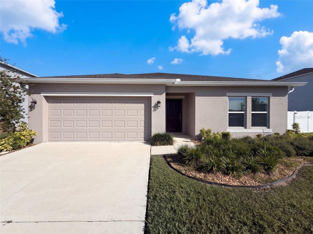 Photo of 124 Citrine Loop, Kissimmee, FL 34758 (MLS # O6448366)