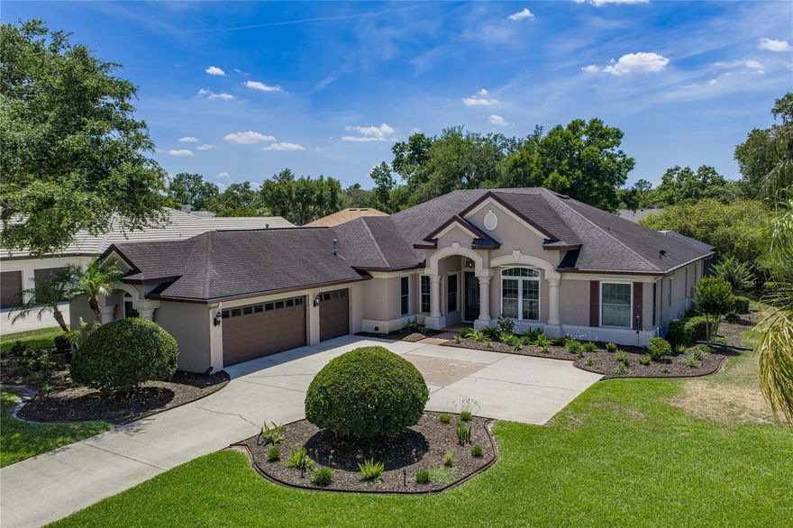 THE PINNACLE OF LUXURY IN FISH HAWK TRAILS 

Experience the perfect blend of architectural elegance and modern peace of mind in this custom-built Arthur Rutenberg estate. Situated on a sprawling .53-acre lushly landscaped corner lot, this meticulously maintained, one-owner home offers 3,162 sq. ft. of  living space within the exclusive guard-gated community of Fish Hawk Trails.  THIS IS AN ARCHITECTURAL MASTERPIECE! 
Step through the grand double-door entrance into a foyer that sets the stage for the rest of the home. You’ll be greeted by soaring volume ceilings, extensive crown molding, and a variety of designer ceiling treatments including tray, coffered, and cathedral styles. The interior is a showcase of craftsmanship, featuring elegant arches, stately columns, and built-in art niches. The heart of the home is the bright, THIS IS A CHEFS DREAM !! This open kitchen designed for entertaining. It features premium granite countertops, a massive island with a double sink, stainless steel appliances, a tile backsplash, and a walk-in pantry. Enjoy your morning coffee in the breakfast nook, where mitered glass windows provide an unobstructed view of your private poolside oasis. Amenities Tennis Courts, Community Parks, Pavilion, Playground, Miles of Nature Walking Trails
EXTENSIVE UPGRADES & PEACE OF MIND ($100K+ INVESTED)
This home has been mechanically and structurally enhanced for longevity and safety:

POWER: Generac Whole-House Generator with remaining warranty.

HVAC & WATER: Brand New AC (2024) and New Hot Water Heater (2024).

POOL: New pool pump, upgraded pool lighting, and custom pavers.

SAFETY: Storm shutters (original + 2024 additions) and gutter guards.

LUXURY FINISHES: New interior paint, flooring enhancements, and fully upgraded bathrooms.
PRIVATE RETREAT
The 3-way split floor plan ensures maximum privacy. The primary suite is a sanctuary featuring rich wood flooring, a cozy sitting area, and a spa-like bath with a newly upgraded shower, garden tub, and dual vanities. For those working from home, a dedicated office/den provides the perfect quiet space.COMMUNITY & LIFESTYLE
Fish Hawk Trails offers a resort lifestyle with 24-hour manned security, over 7 miles of walking trails, tennis and pickleball courts, a clubhouse, soccer fields, and nature preserves. Benefit from Low HOA fees and A-rated schools. This is a rare opportunity to own a "ready to move in" gem in one of Lithia’s most desirable communities. Schedule your private tour today!