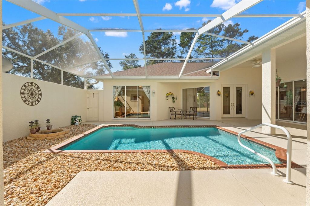 Photo of 11405 Warm Wind Way, Weeki Wachee, FL 34613 (MLS # W7879847)