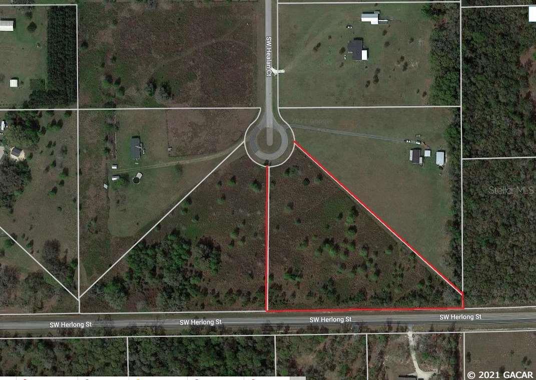 4.98 acre acre parcel on the cul de sac in quiet subdivision with paved roads. Tract is comprised of mostly open meadow with a sprinkling of trees. Would make a great home site, set up a mobile home or small horse farm. Located in Southern Columbia County Florida, an area of homes, farms and recreational opportunities. A short drive from High Springs to the south, or Lake City to the north. Nearby is the Ichetucknee State Park and Three Rivers recreational area with the confluence of the Suwannnee, Santa Fe and Ichetucknee Rivers, (swimming, tubing, kayaking, boating, fishing). Open Builder.
